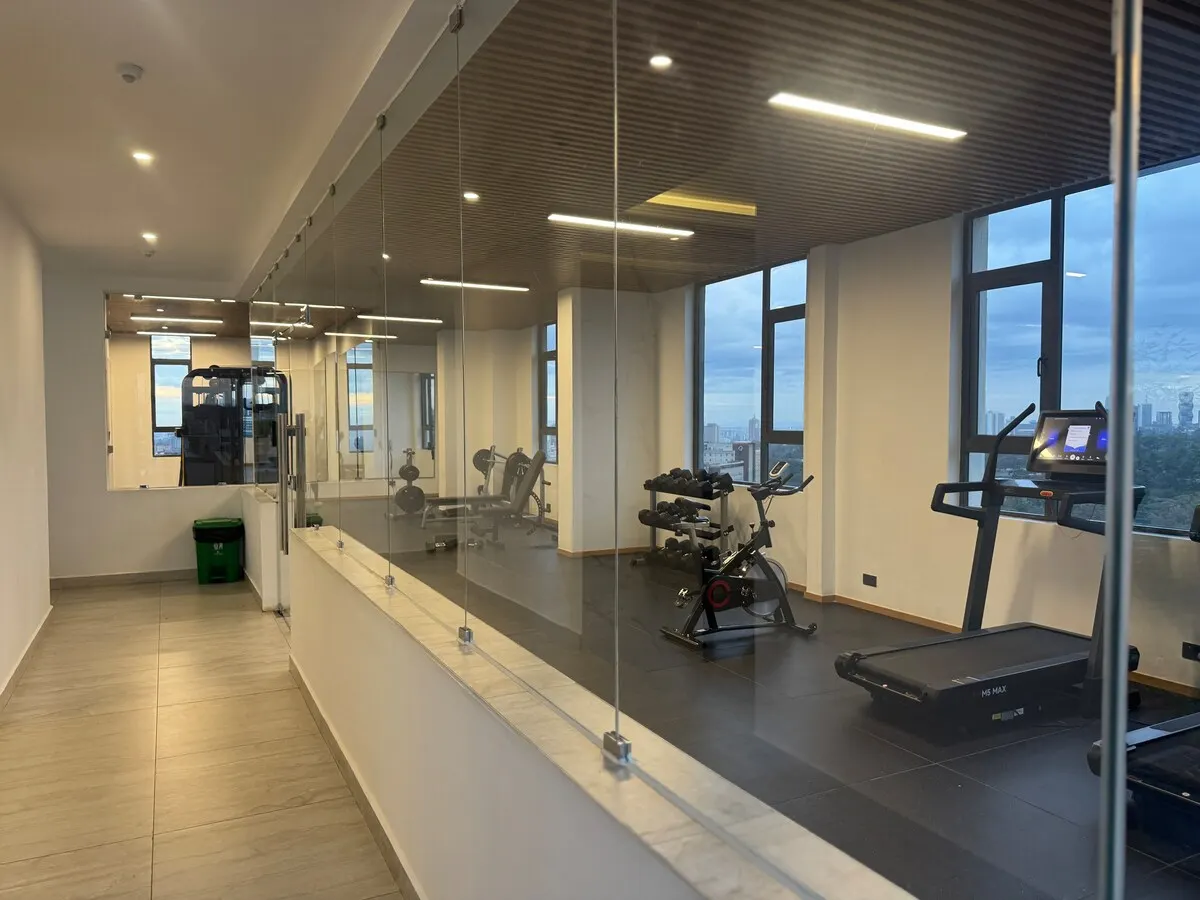 Gym with treadmill, bike and weights