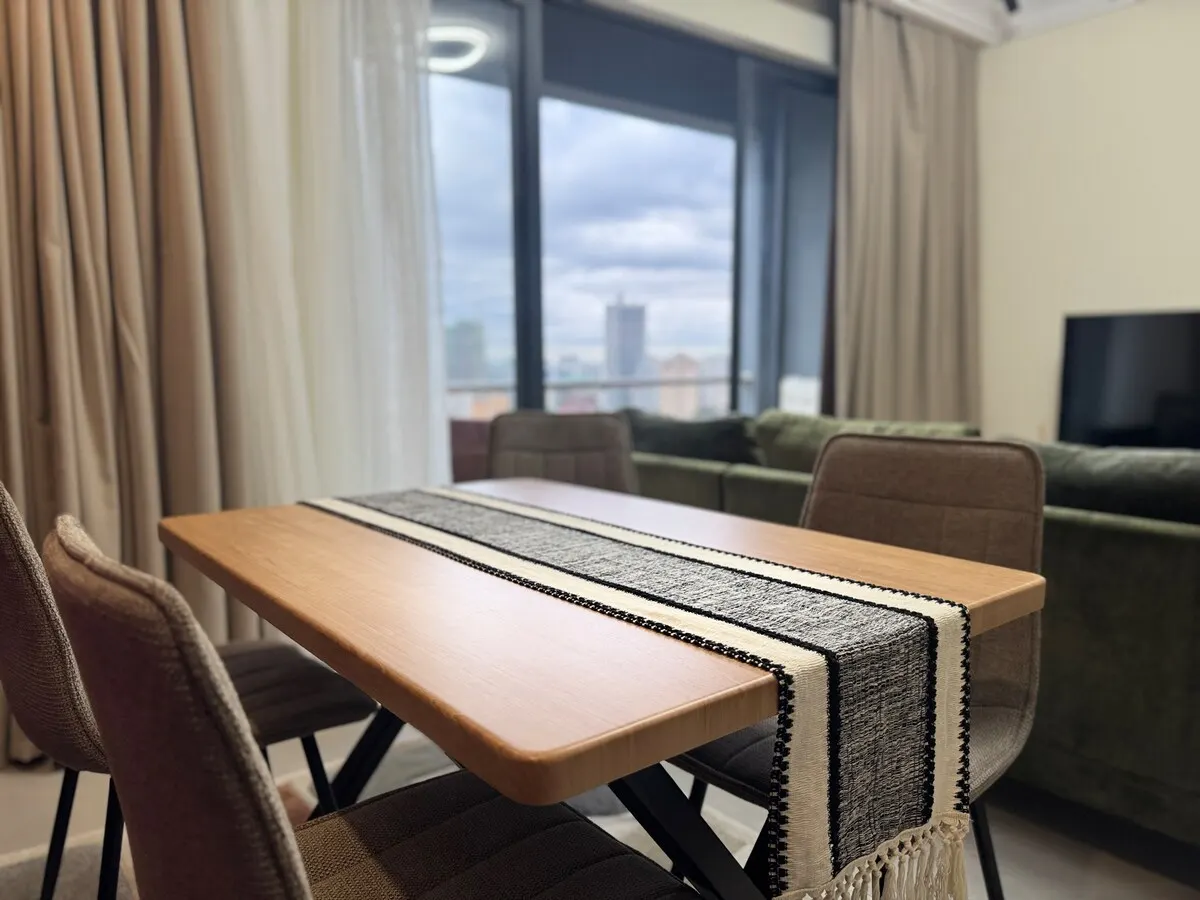 Dining table with a woven runner